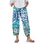 Pants & Trousers Women's trousers featuring an abstract print, stylish graffiti design, and a loose fit with pockets.