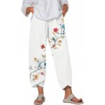 Pants & Trousers Women's trousers featuring an abstract print, stylish graffiti design, and a loose fit with pockets.