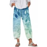 Pants & Trousers Women's trousers featuring an abstract print, stylish graffiti design, and a loose fit with pockets.